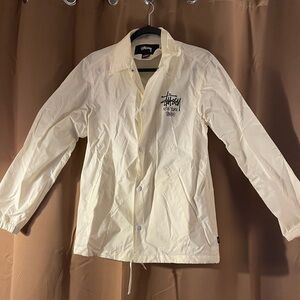 Never worn, it’s wrinkled but in perfect shape